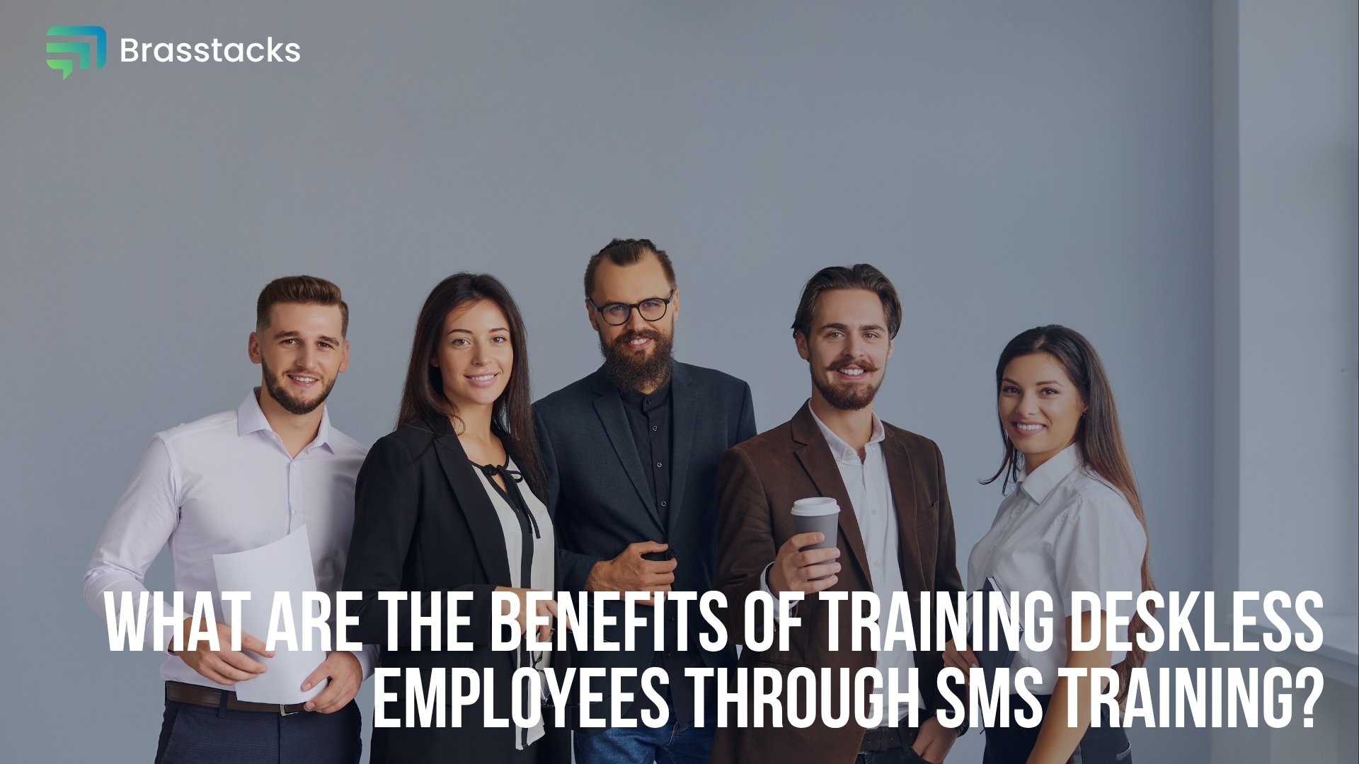 What are the benefits of training deskless employees through SMS training